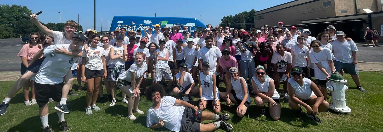 Large group of people around the ice cream truck